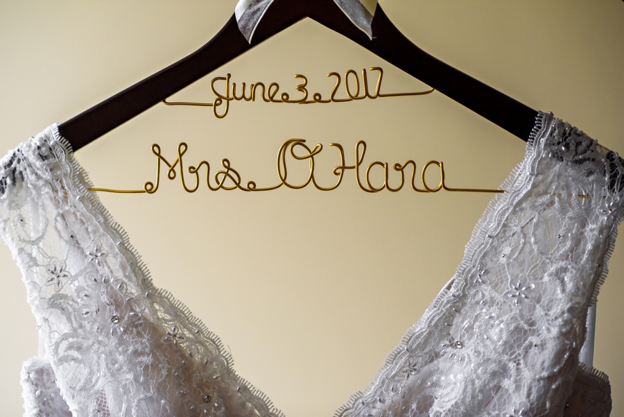A custom handmade hanger for the brides wedding dress.